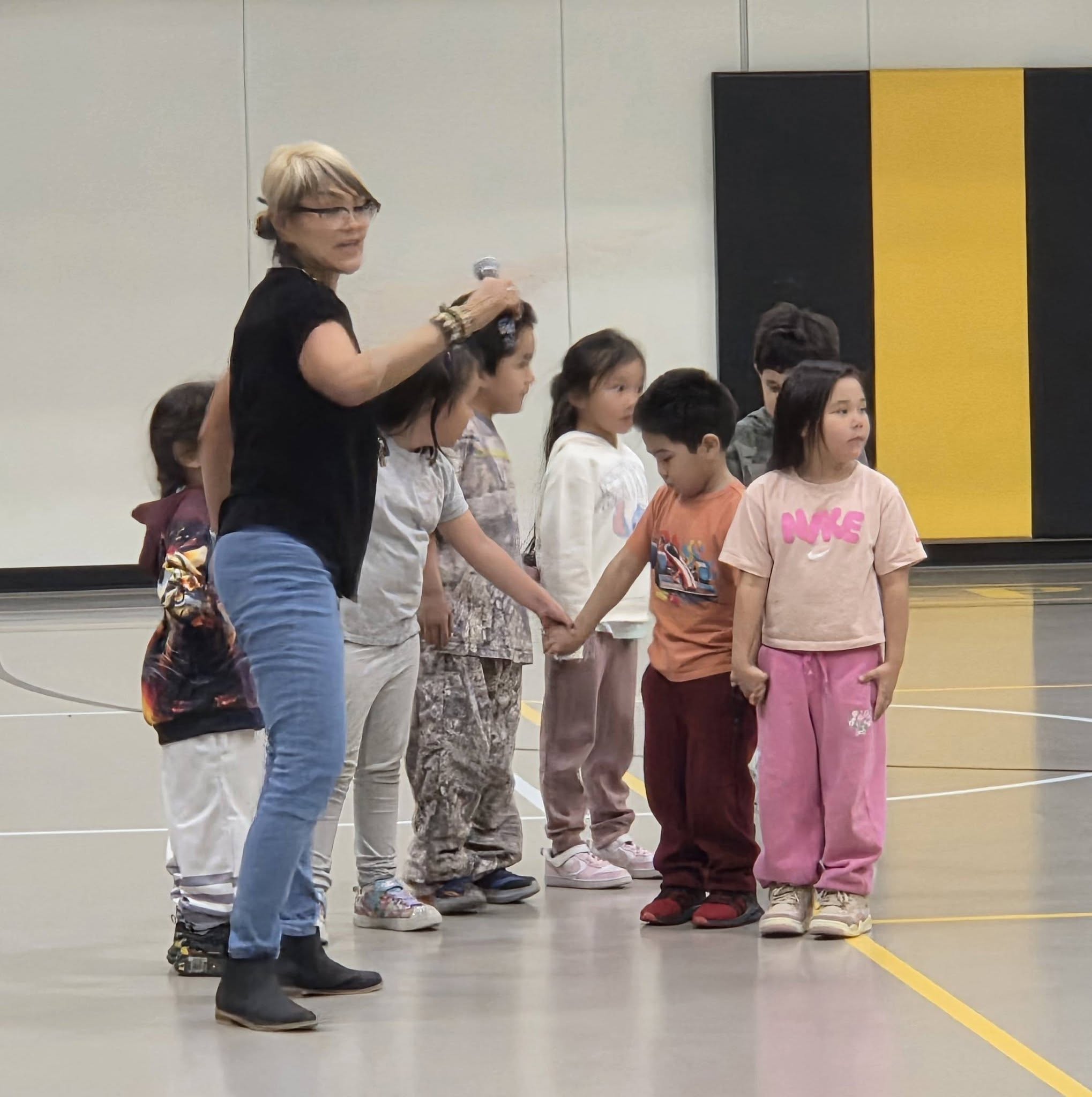 Coach Daisy put on an amazing pep rally for the Tikigaq Cross-Country team as they head… (3/5)
